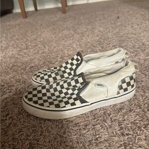 Vans Black and White Checkerboard Slip-On Sneakers